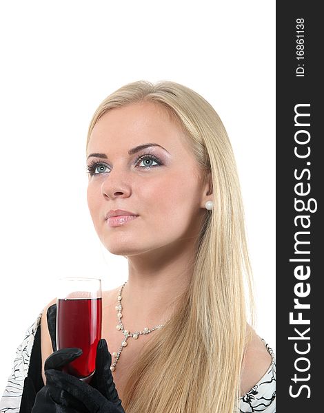 Luxuriously young blond woman drink red wine. Luxuriously young blond woman drink red wine