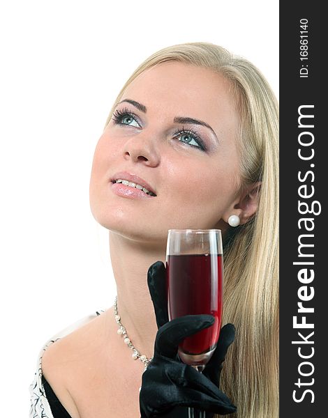 Luxuriously young blond woman drink red wine. Luxuriously young blond woman drink red wine