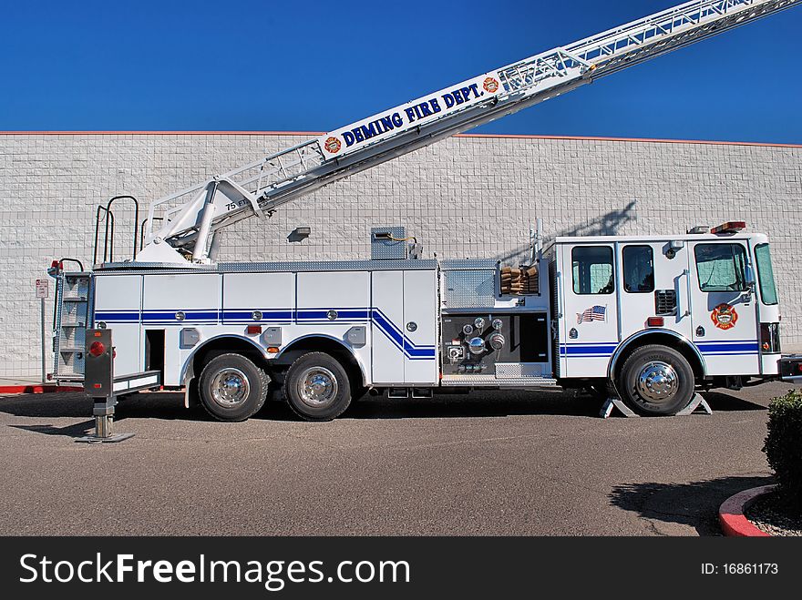 New fire truck with a big ladder on display. New fire truck with a big ladder on display