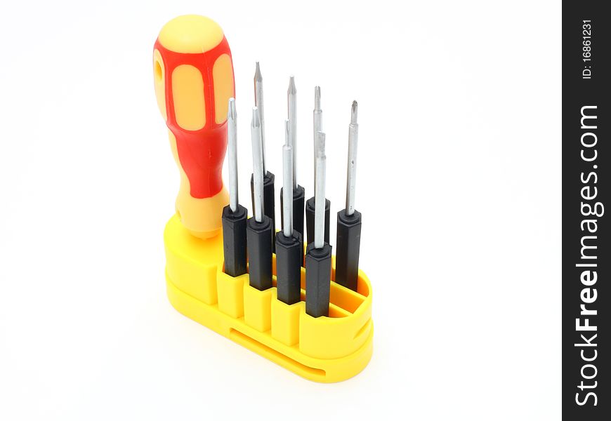 Set of screw-drivers with the orange handle on a white background