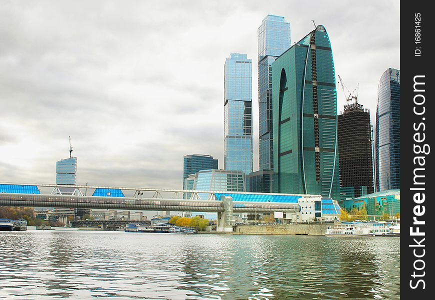 The image of skyscrapers on the embankment of Moscow river