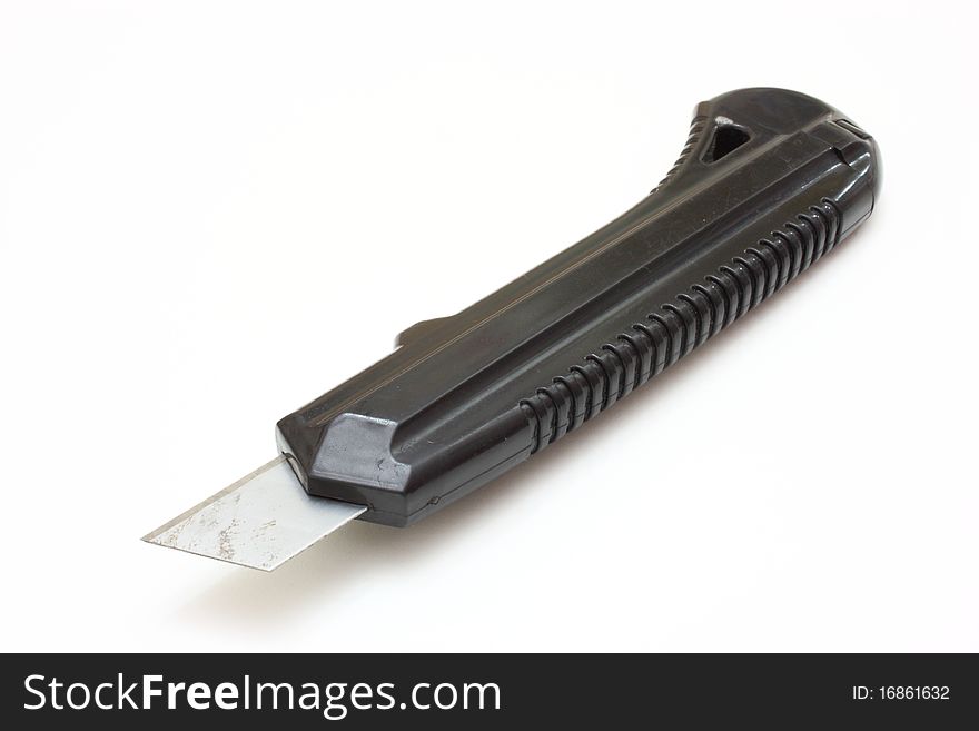 Writing knife of black color on a white background. Writing knife of black color on a white background