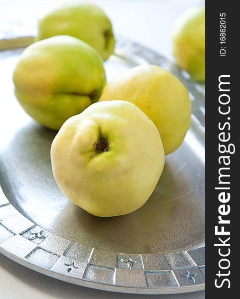 Whole Quinces on pewter tray