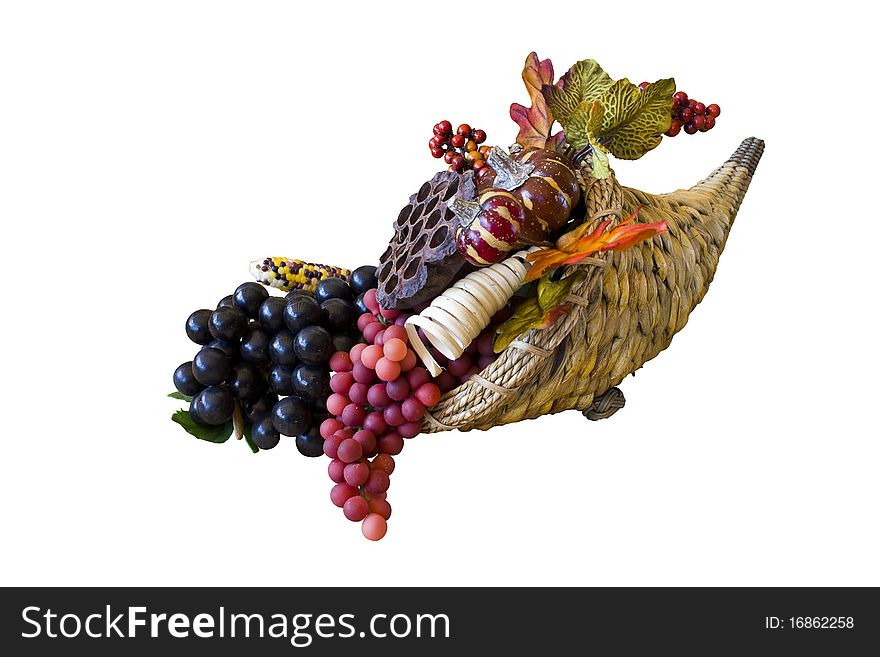 Cornacopia with grapes, gourds, autumn eaves isolated on a white background. Cornacopia with grapes, gourds, autumn eaves isolated on a white background
