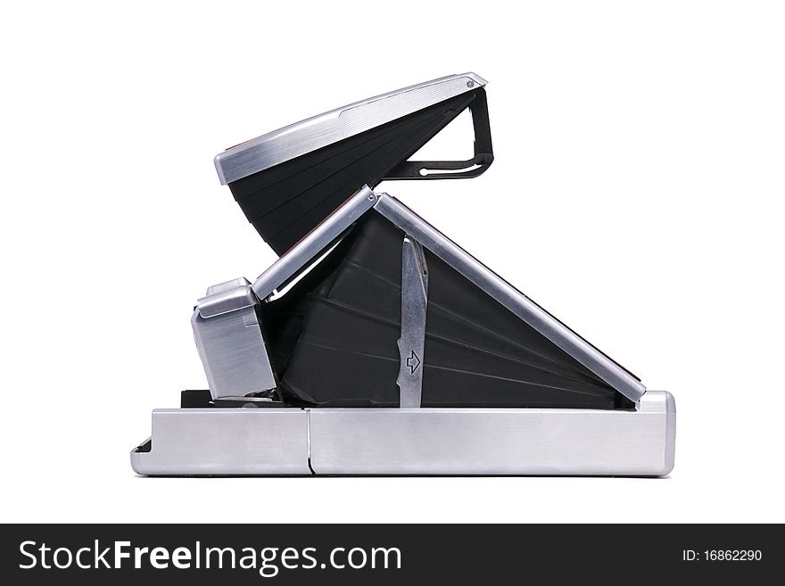 Vintage Folding Instant Camera Isolated on a White Background. Vintage Folding Instant Camera Isolated on a White Background