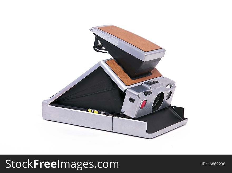 Vintage Folding Instant Camera Isolated on a White Background. Vintage Folding Instant Camera Isolated on a White Background