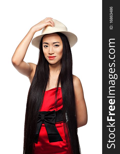Beautiful chinese girl with long hair on the white background with white hat. Beautiful chinese girl with long hair on the white background with white hat