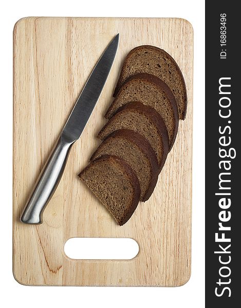 Metallic knife and sliced bread on the kitchen board isolated on white