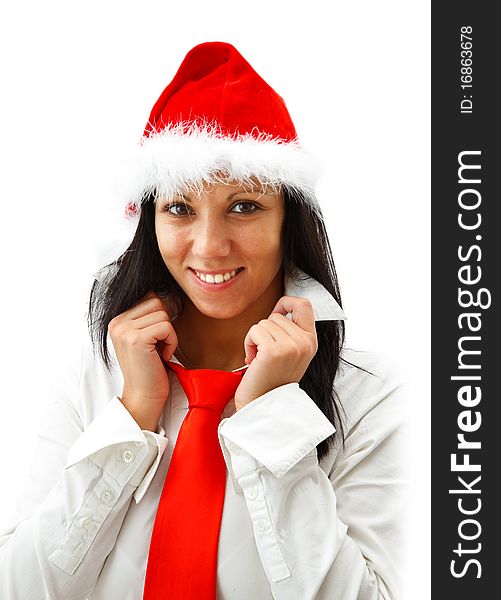 Attractive smiling woman in santa hat wearing a red tie. Attractive smiling woman in santa hat wearing a red tie