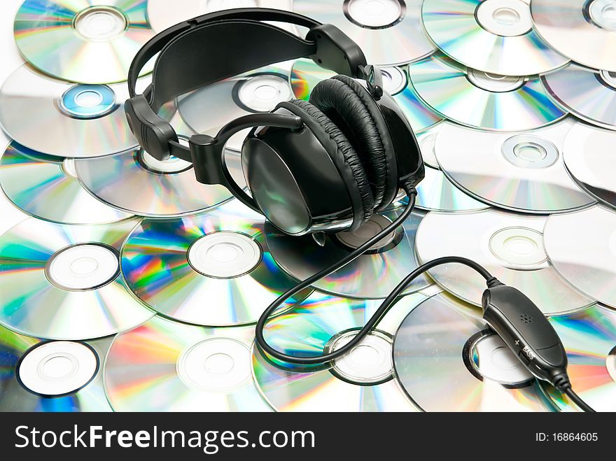 Black headphones on dvd background