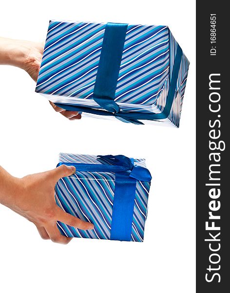 Two blue gifts boxes in man's hands. Studio shot. Two blue gifts boxes in man's hands. Studio shot