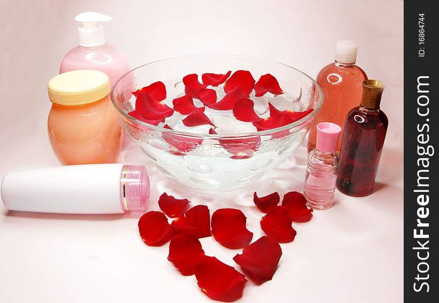 Spa hair mask creme liquid soap candle essences and red rose petals. Spa hair mask creme liquid soap candle essences and red rose petals