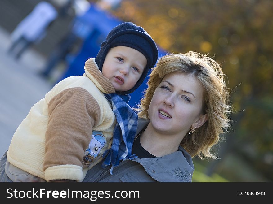 Mother and the son play park. Mother and the son play park