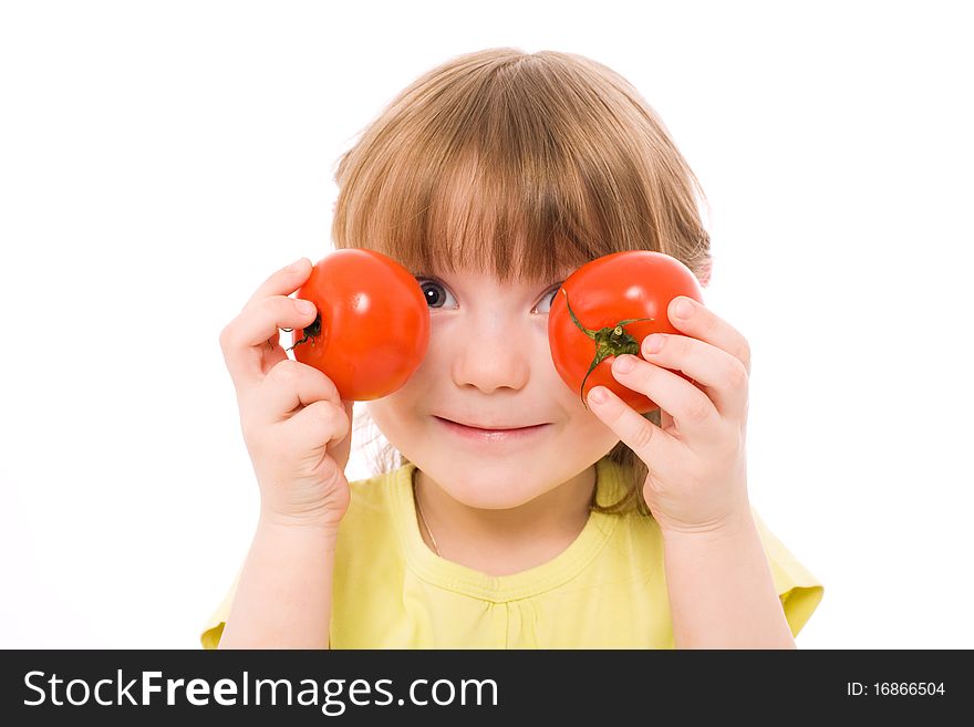 The portrait of a lovely girl holding two red tomatoes in her hands. The portrait of a lovely girl holding two red tomatoes in her hands