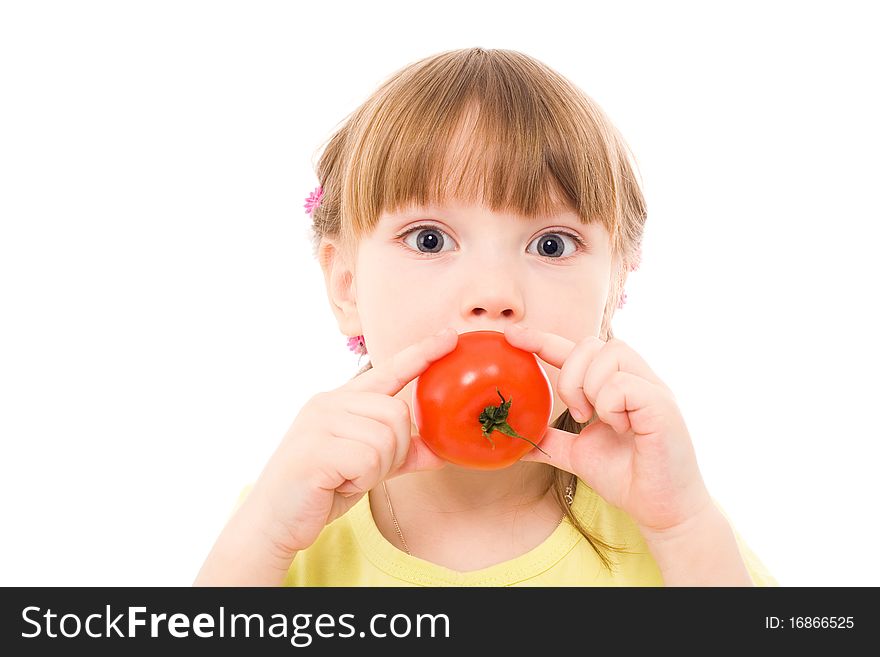 The portrait of a lovely girl holding a red tomato in her hands. The portrait of a lovely girl holding a red tomato in her hands