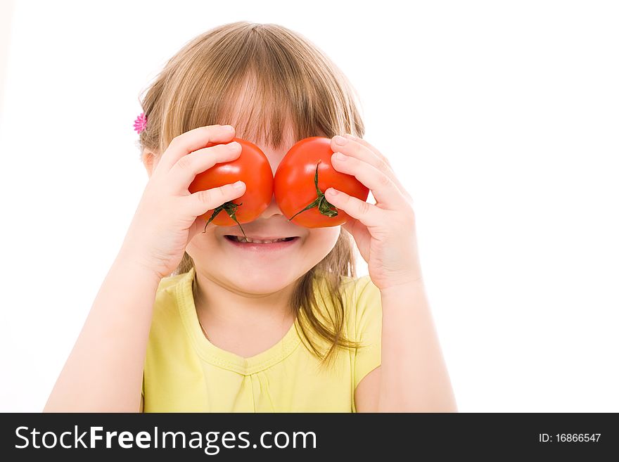 The portrait of a lovely girl holding two red tomatoes in her hands. The portrait of a lovely girl holding two red tomatoes in her hands
