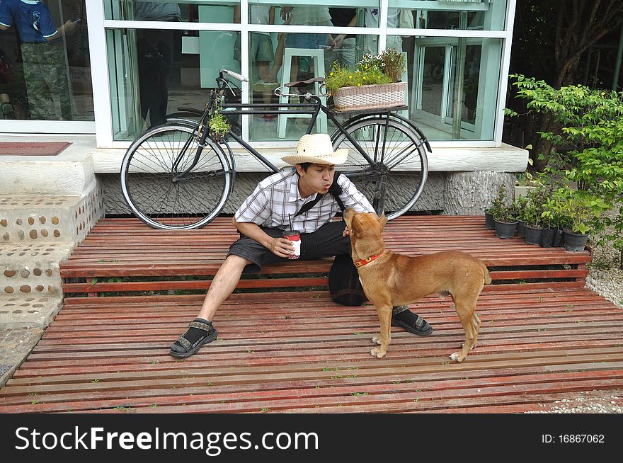 Asia Thailand Man Cowboy Sit With Dog