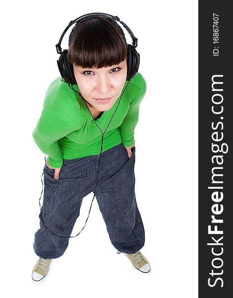 Young adult woman with headphones. over white background. Young adult woman with headphones. over white background