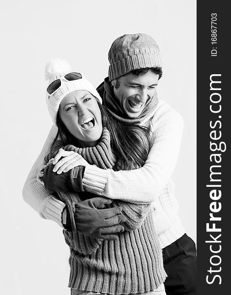 Young couple in winter clothes, enjoying their time together. Young couple in winter clothes, enjoying their time together