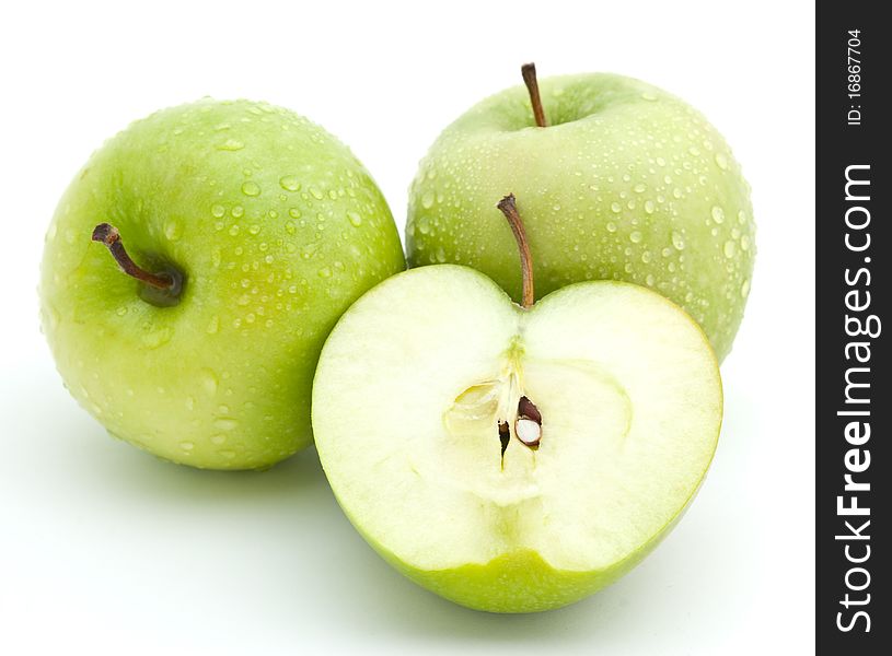 Green apples on the white background