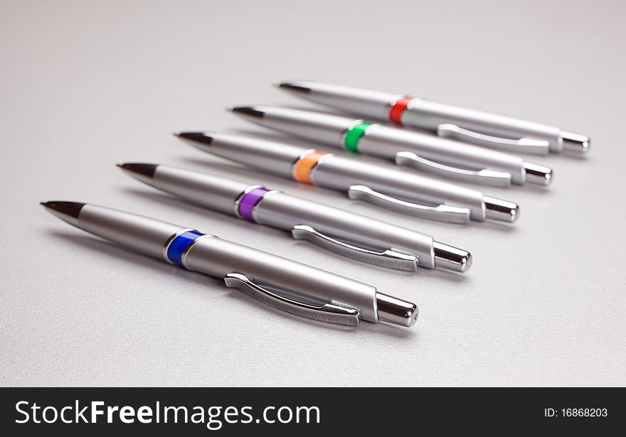 Set of colored pens on white table. Set of colored pens on white table
