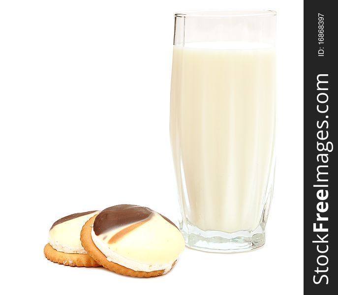 Chocolate chip cookies and a glass of milk isolated on white. Chocolate chip cookies and a glass of milk isolated on white