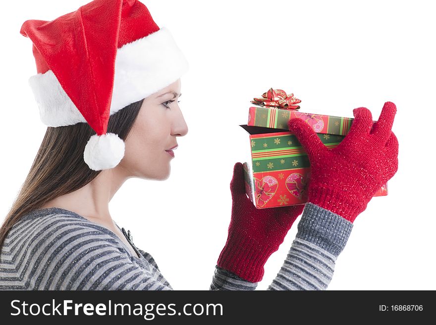 Happy young woman opening a Christmas present