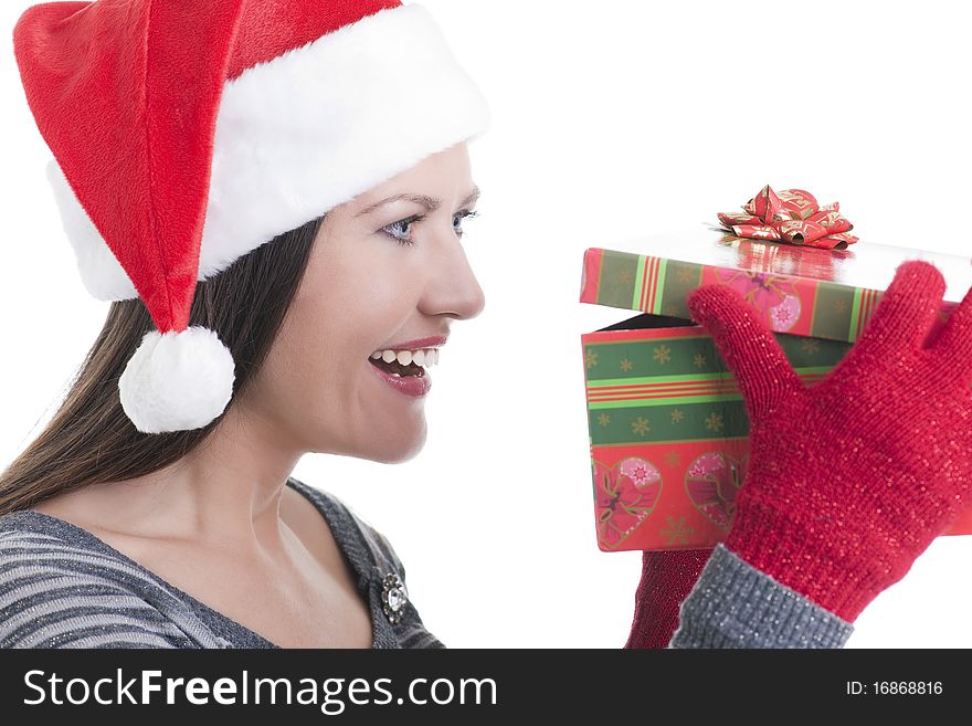 Happy young woman opening a Christmas present