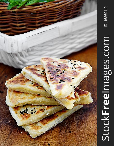 Flat wheat cake with cheese and spice