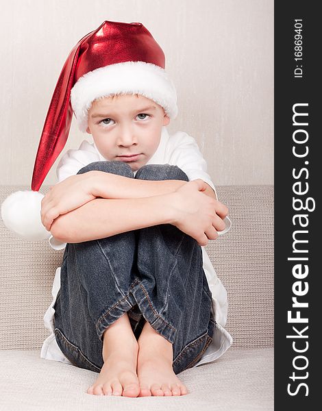 Portrait of boy in red christmas hat