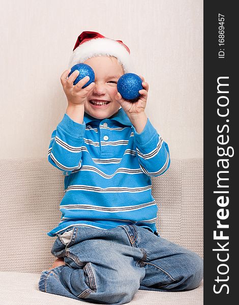 Boy in red christmas hat
