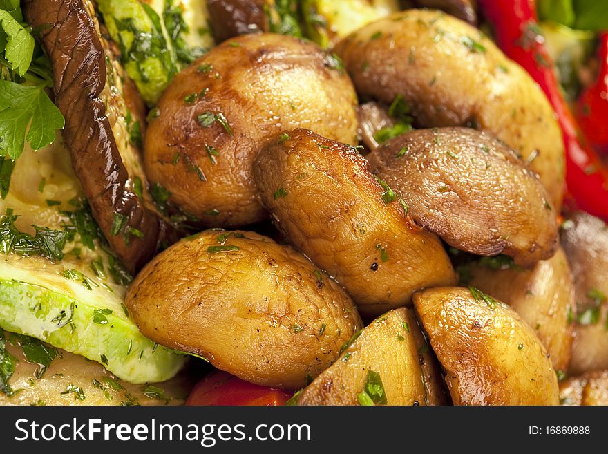 Baked potato, zucchini, eggplant on plate. Vegetarian food