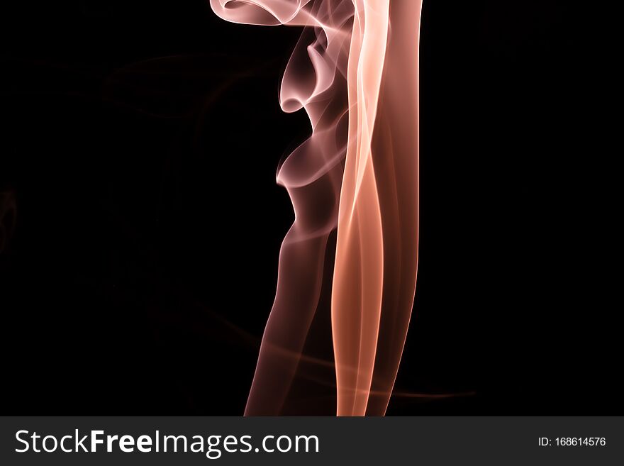 Colored smoke on a black background.