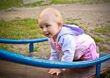 Beautiful Baby Girl Climbing A Slide In Playground Royalty Free Stock Photography Beautiful Baby Girl Climbing A Slide In Playground Royalty Free Stock Photography