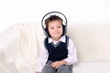 Little Boy Enjoys The Music Royalty Free Stock Photography Little Boy Enjoys The Music Royalty Free Stock Photography