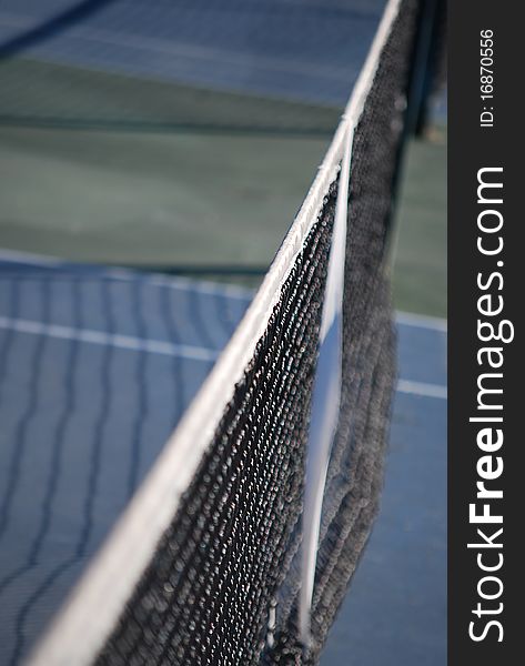 Net on the tennis sport court. Sports equipment.
