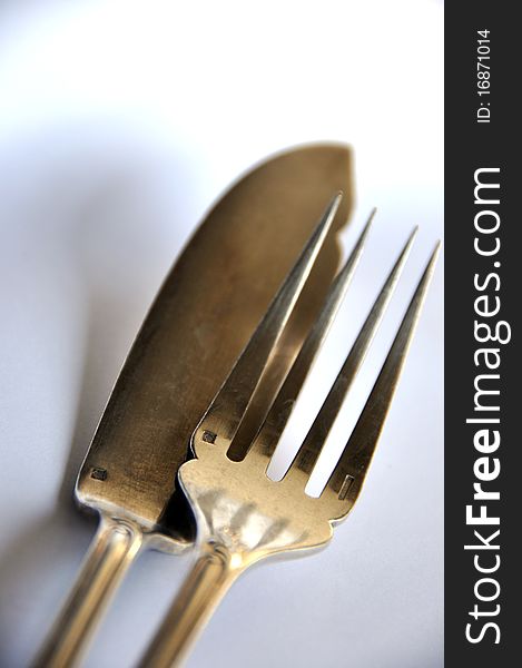 Luxury cutlery on soft focus over white background