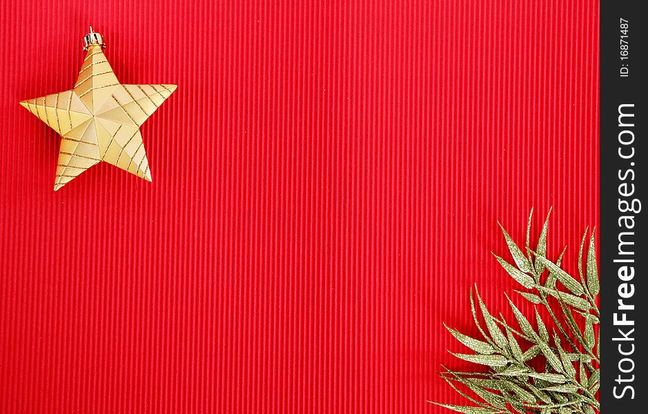 Gold Christmas star and green ribbon  over red background. Gold Christmas star and green ribbon  over red background