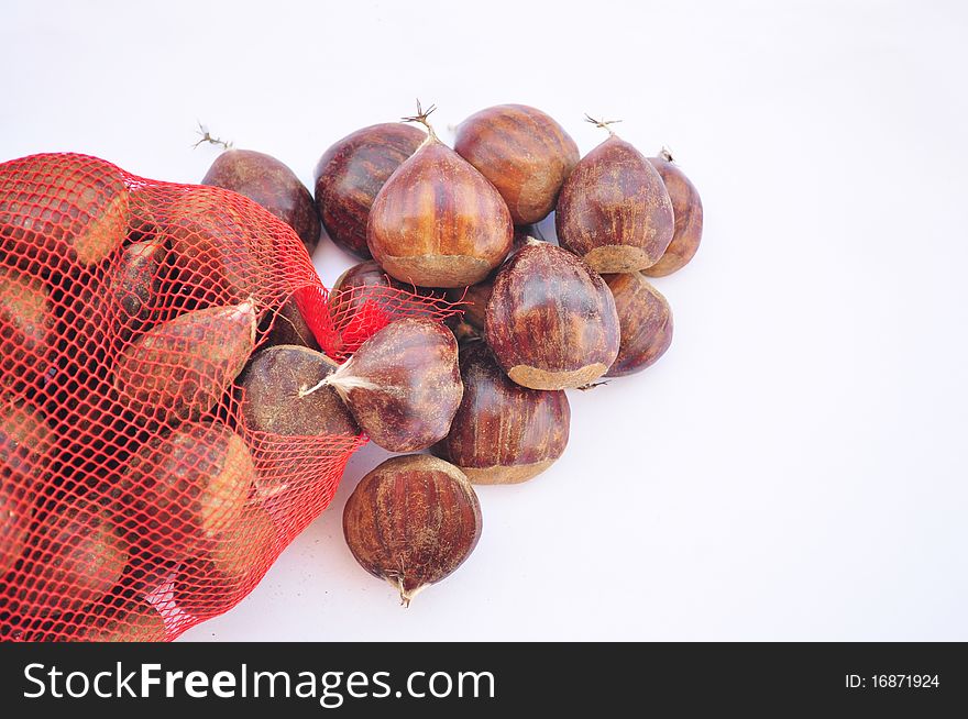 a few chestnuts with white background