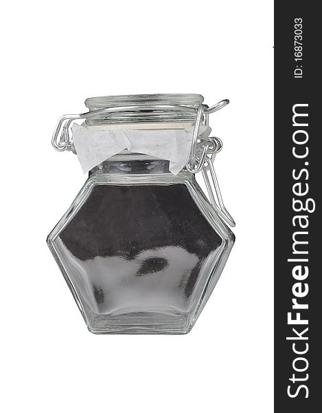 An isolated glass jar, photographed in a studio.