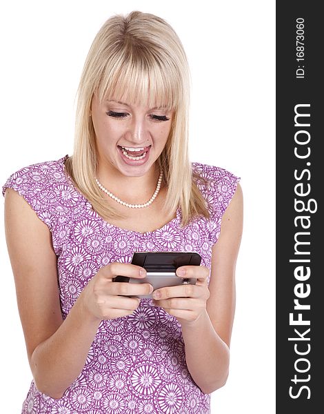 A woman showing her personality by texting something funny. A woman showing her personality by texting something funny.