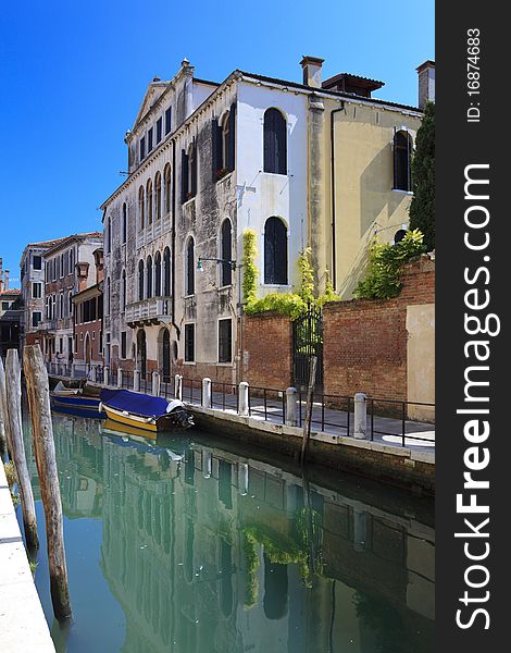 View of reflection in venetian canal. Italy. View of reflection in venetian canal. Italy