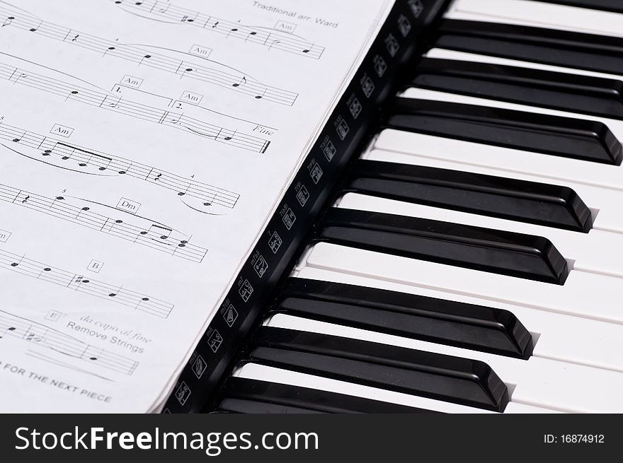 Close up shot of black and white keys of a piano. Close up shot of black and white keys of a piano