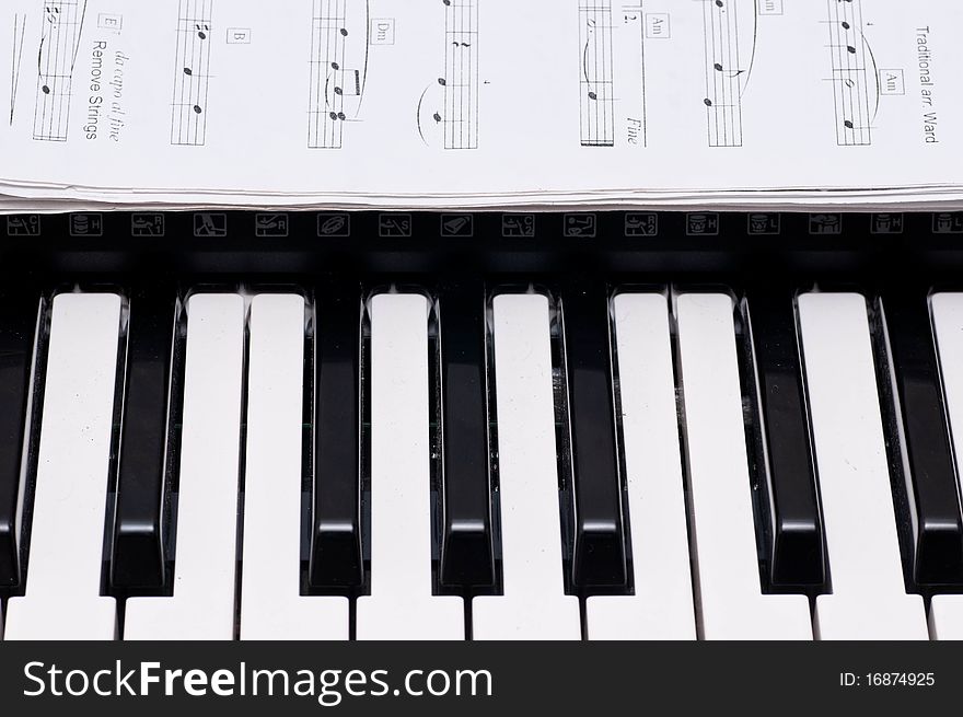 Close up shot of black and white keys of a piano. Close up shot of black and white keys of a piano