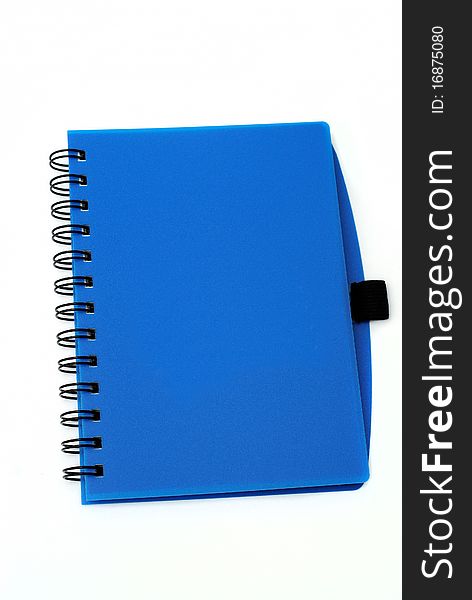 A blue book isolated ona white back ground