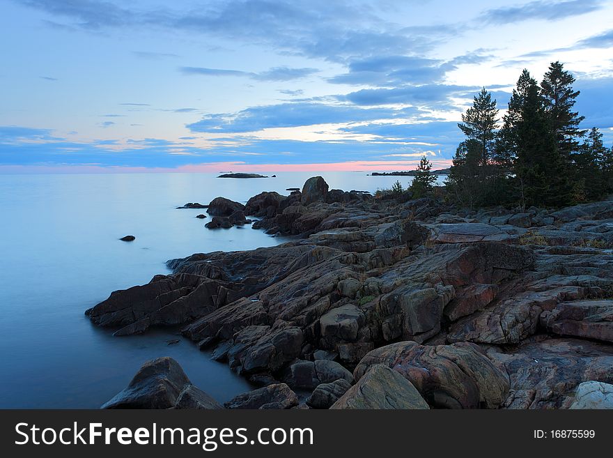 A calm coast landscape after sunset