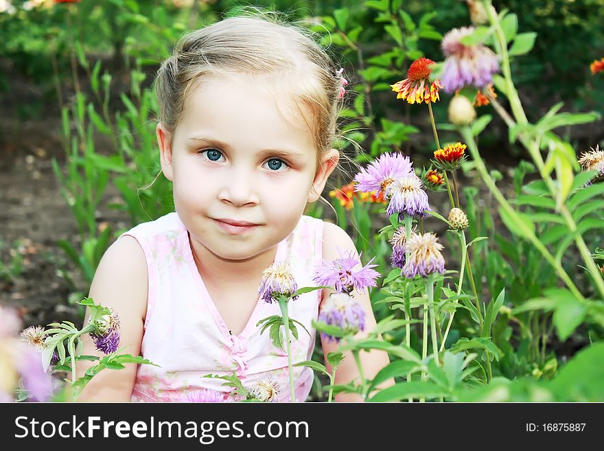 Beautiful girl in flowers in summer. Beautiful girl in flowers in summer