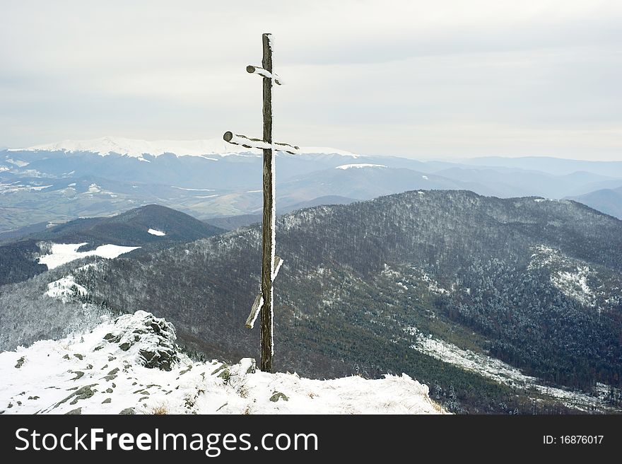Cross on top of the Carpathian mountain Pikuy. Ukraine. Cross on top of the Carpathian mountain Pikuy. Ukraine