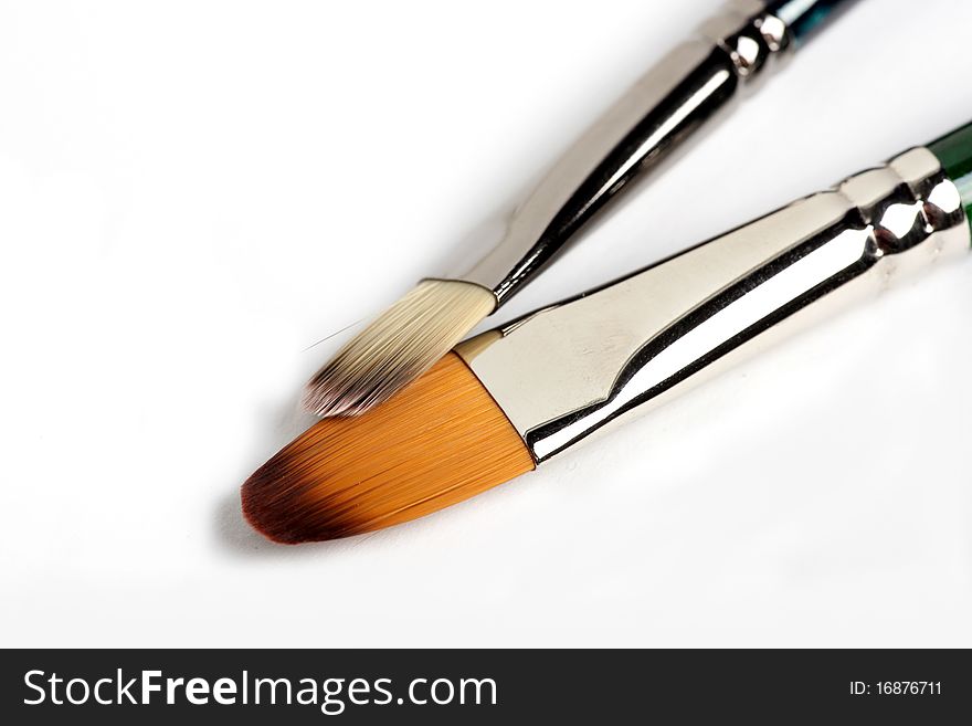 Two brushes on a white background