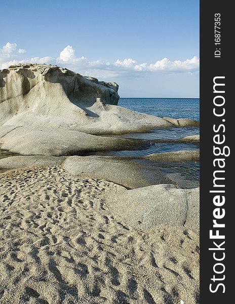 Sea rocks at Kakoudia beach near the city of Ierissos in Chalkidiki North Greece. Sea rocks at Kakoudia beach near the city of Ierissos in Chalkidiki North Greece